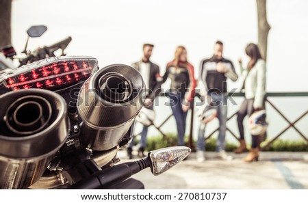 bikers, group of friends spending time on the hills after motorcycle ride.