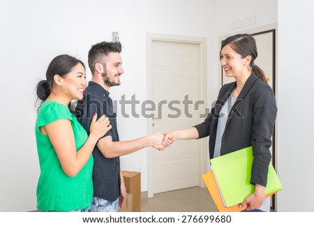 estate agent close a contract. family buying new apartment after choosing it. concept about houses, business, and people