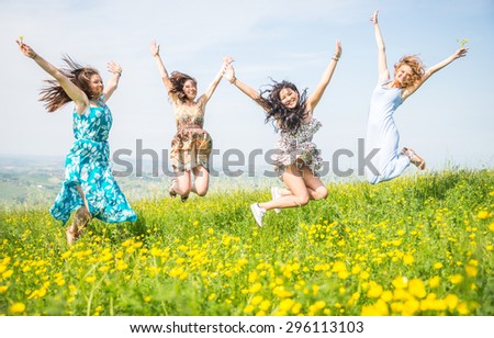 group of girls jumping in the nature. concept about women, youth, nature and people