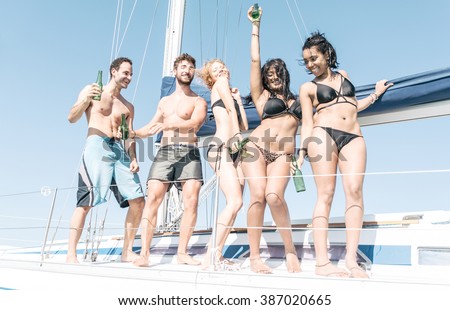 Boat party. Group of friends dancing on a yacht. Summer party spending time with friends and sharing good mood