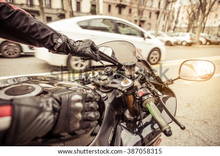Motorcycle ignition. Biker starting his motorcycle up. Concept about transportation