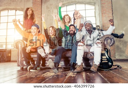 Mixed race group of teenagers having fun on the couch