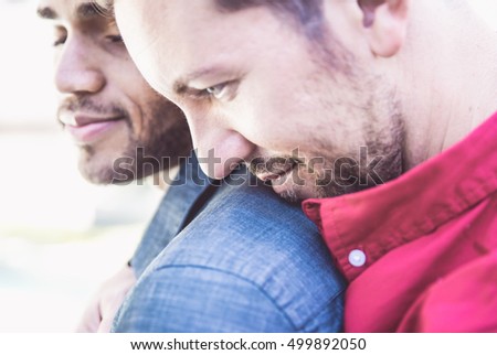 Gay couple portrait. Two boys sharing lovely emotions