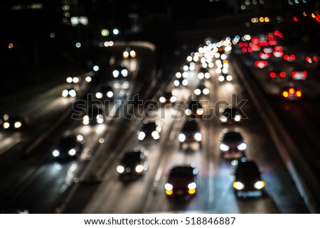 Traffic on a highway, many cars driving