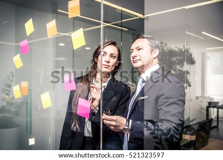Office people working and talking about business plans
