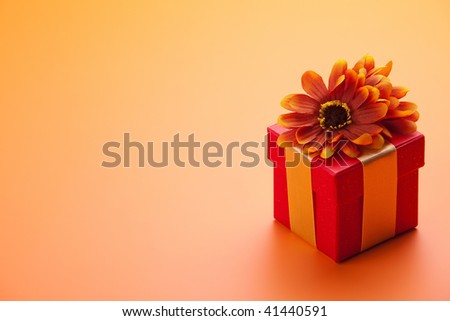 red gift box with a red tape