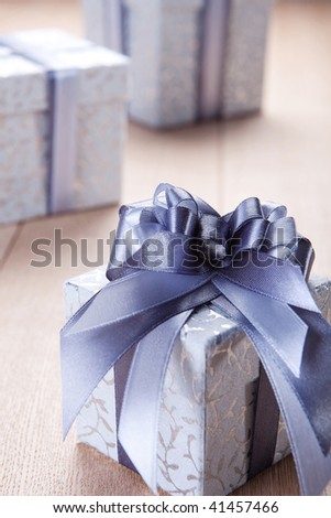 blue gift box with a blue tape