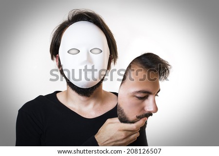 Two faced male, real face is actually mask.