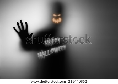 Happy halloween saying ghost. This is my image already but i retouched it for halloween who wants to use for posters, banner, placar or bill.