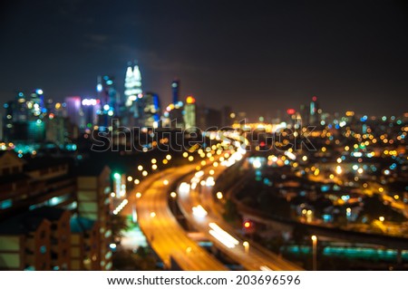 Blurred lights of Kuala Lumpur skyline, round shape bokeh