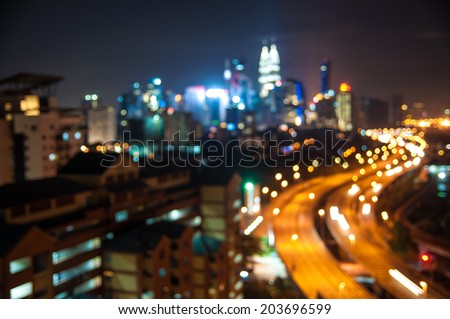 Blurred lights of Kuala Lumpur skyline, round shape bokeh