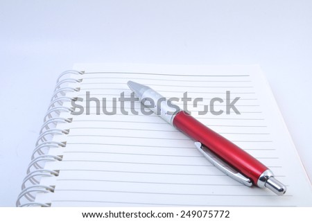 Calculator, pen, white paper for notes lie on white background