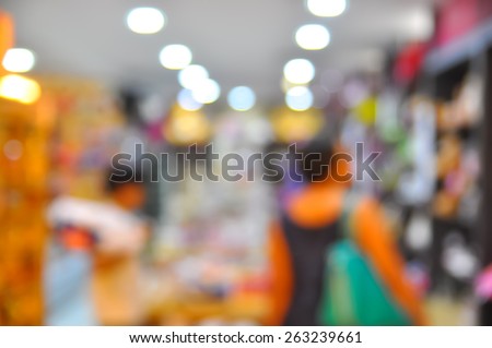 Blur image people at stationery store with bokeh