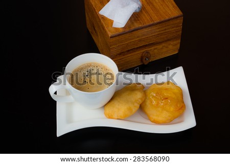 Coffee with Deep-fried dough stick breakfast in Thailand