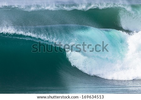 Ocean Wave Shape Detail Ocean wave crashing rolling hollow lip with fine line detail of sea waters shape in nature