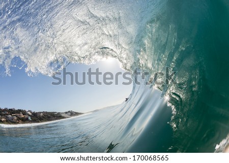Inside Hollow Ocean Wave Clean Ocean Wave Surging And Crashing Towards Shallow Sandbars And Shoreline