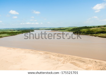 Air Flying Landscape River Beach Air flying birds eye view of farming fields wide river over the colorful landscape to the  ocean beach