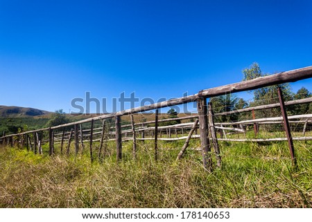 Fence Farm Mountains Wood pole fence section in mountain cattle farm