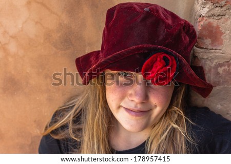 Girl Red Hat Eye Portrait Teen girl close portrait happy mood one eye visible red rose