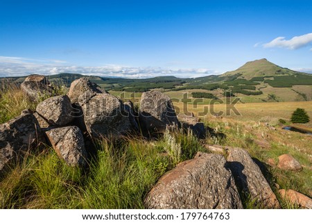 Mountains Rocks Valley Summer Rocky hilltop in the mountain landscape valley terrain with distant trees in summer