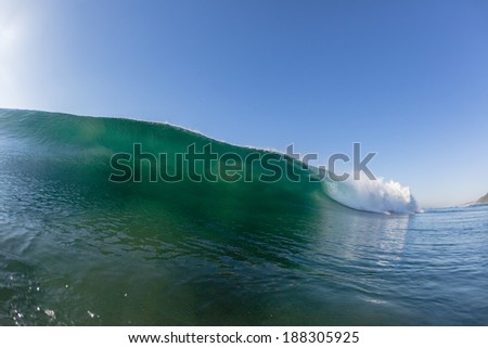 Ocean Wave Crashing Hollow Power Ocean wave  upright hollow crashing pitching water power onto shallow reefs early morning