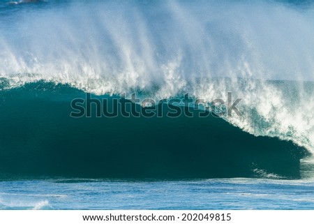 Ocean Wave Power Ocean wave crashing sea water on shallow coastline reefs with energy power