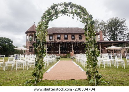 Wedding Decor Home Wedding decor chairs ceremony lawn pool landscape with guests lunch dinner table settings on porch veranda of mansion home.