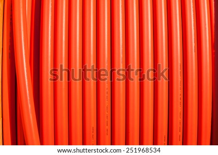 Cable  Fiber optic internet plastic cable closeup  abstract background on installation drum