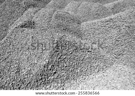 Raw Stone Dolomite \
Raw stone dolomite piles in black white background detail from quarry for concrete mixing on construction