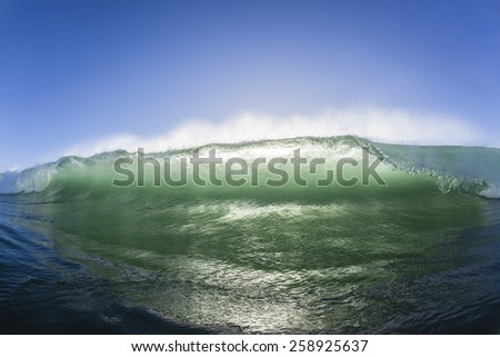 Wave\
Ocean wave swimming surfing encounter crashing water wall morning back-light