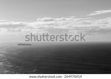 Ship Ocean Birdseye  Black White\
Ship travels open ocean seas overlooking birds-eye in black white vintage contrasts