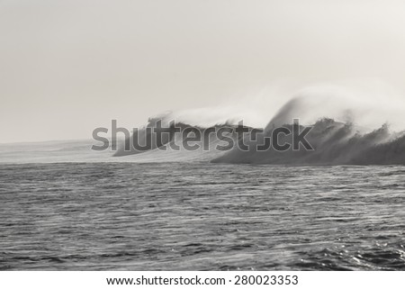 Wave Power \
Ocean wave crashing water power in vintage black and white