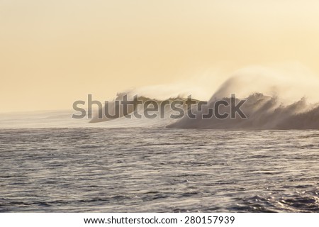 Ocean Wave Power\
Ocean wave wall crashing water power along beach coastline,