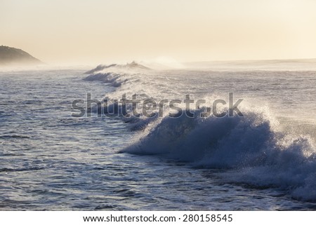 Ocean Wave Water\
Ocean wave crashing water  along beach coastline,