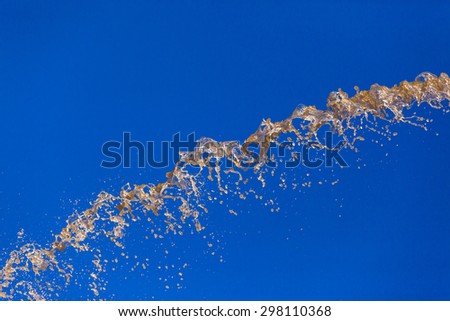 Water Blue Abstract\
River Water pressure pumped volumes sprayed falling across blue sky abstract concept background landscape