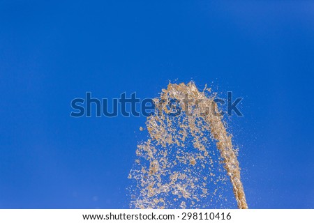 Water Pumping Blue
River Water pressure pumped volumes sprayed falling across blue sky abstract concept background landscape