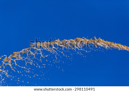 Water Blue Sky \
River Water pressure pumped volumes sprayed falling across blue sky abstract concept