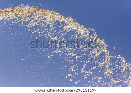 Falling Water Blue
River Water pressure pumped volumes sprayed falling across blue sky abstract detail