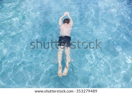 Teenager Swimming Pool\
Teenager boy swimming pool training exercise recreation summer