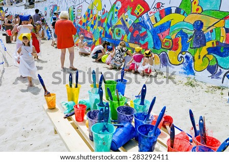 Odessa, Ukraine - 31 May 2015: Opened openair Festival of street art. Graffiti drawings on the wall. People draws on a wall
