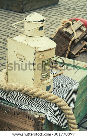old retro objects antique sea ship lanterns, wooden crates and ropes, vintage image retro style effect filter