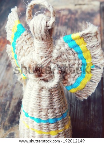 Traditional faceless Ukrainian doll motanka with angel wings and halo