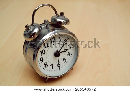 Old fashioned metallic alarm clock