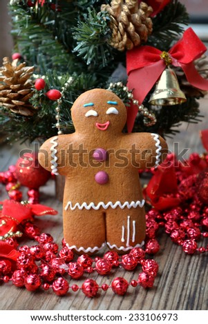 Holiday con?ept - Christmas tree and a cookie man made of ginger bread