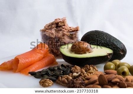 Some Healthy Food With Avocado, Nut, Smoked Salomon, Tuna And Olive