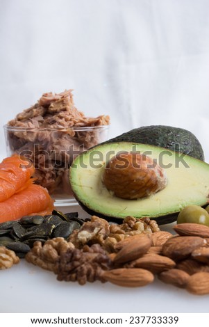 Some Healthy Food With Avocado, Nut, Smoked Salomon And Tuna