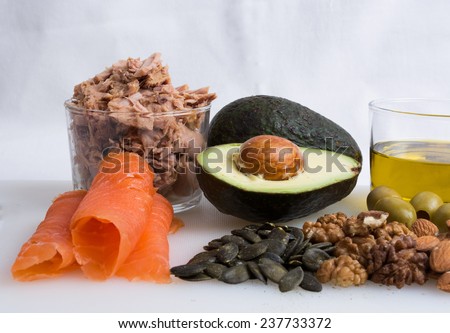 Some Healthy Food With Avocado, Nut, Smoked Salomon, Tuna, Olive Oil And Olive