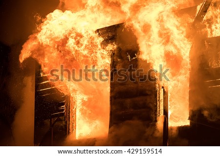 Photo of Huge Flame Distracting House on Fire. Fire Safety Concept