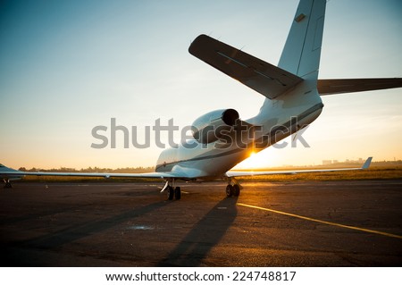 Ready to take off. Rear view of airplane taking off from airport
