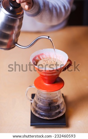 Alternative coffee making. Close-up image of barista making fresh coffee